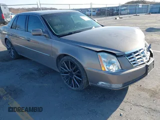 2006 Cadillac DTS 1SB z VIN 1G6KD57Y66U189618, wystawiony jako IAAI lot #41935246 z przebiegiem 140 347 mil mil oraz . Historia ofert i sprzedaży dostępna na DreamBid. Obrazek 1.