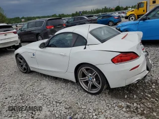 2011 BMW Z4 sDrive35is z VIN WBALM1C59BE393773, wystawiony jako Copart lot #56021935 z przebiegiem 86 666 mil mil oraz Szkoda całkowita • Salvage title. Historia ofert i sprzedaży dostępna na DreamBid. Obrazek 2.