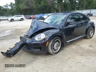 2016 Volkswagen Beetle Wolfsburg Edition with VIN 3VWF17AT8GM637442, listed as a Copart auction lot 55034595 with 137,211 mi miles and Salvage Title. Bid and sale history available at DreamBid. Image 1.
