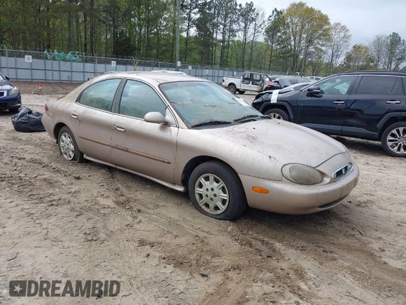 1999 Mercury Sable GS with VIN 1MEFM50U4XG601278, listed as a IAAI auction lot 41940748 with Not Provided miles and . Bid and sale history available at DreamBid. Image 1.