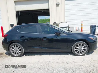 2016 Mazda 3 S Grand Touring z VIN JM1BM1N37G1287136, wystawiony jako IAAI lot #42171368 z przebiegiem 155 685 mil mil oraz . Historia ofert i sprzedaży dostępna na DreamBid. Obrazek 13.