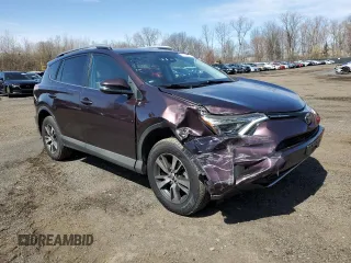 2018 Toyota RAV4 XLE with VIN 2T3RFREVXJW841741, listed as a Copart auction lot 51378385 with 114,842 mi miles and Salvage Title. Bid and sale history available at carsss.com. Image 4.