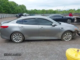 2017 Kia Optima EX with VIN 5XXGU4L34HG126243, listed as a IAAI auction lot 42180111 with 171,747 mi miles and . Bid and sale history available at DreamBid. Image 14.