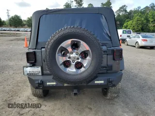 2017 Jeep Wrangler Unlimited Sport with VIN 1C4BJWDG8HL680627, listed as a Copart auction lot 61241735 with 100,890 mi miles and Salvage title. Bid and sale history available at DreamBid. Image 6.