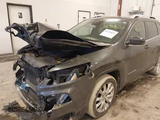 2015 Jeep Cherokee Limited with VIN 1C4PJLDS2FW643738, listed as a IAAI auction lot 41719033 with 102,630 mi miles and . Bid and sale history available at DreamBid. Image 6.