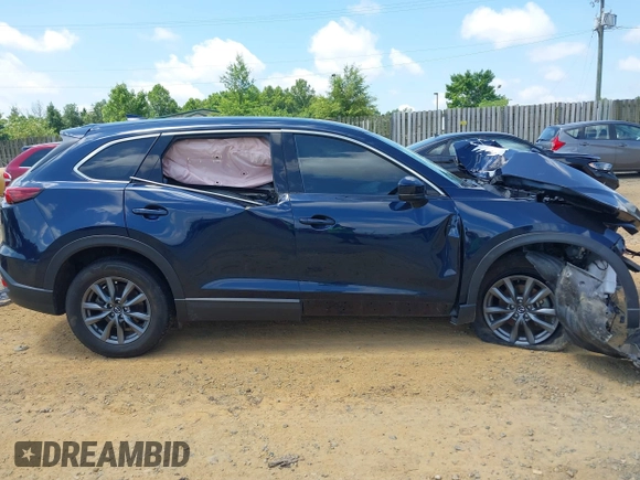 2022 Mazda CX-9 Touring z VIN JM3TCBCY7N0600370, wystawiony jako IAAI lot #42658049 z przebiegiem 113 000 mil mil oraz . Historia ofert i sprzedaży dostępna na DreamBid. Obrazek 14.