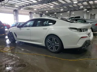 2022 BMW 8 Series 840i with VIN WBAGV4C06NCH11761, listed as a Copart auction lot 79094614 with 37,994 mi miles and Salvage title. Bid and sale history available at DreamBid. Image 2.