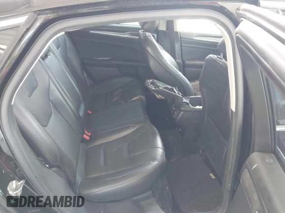 2016 Ford Fusion Titanium with VIN 3FA6P0K99GR235692, listed as a IAAI auction lot 42587743 with 169,467 mi miles and . Bid and sale history available at DreamBid. Image 8.