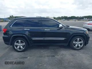 2012 Jeep Grand Cherokee Overland with VIN 1C4RJECT4CC299549, listed as a IAAI auction lot 41917306 with 229,256 mi miles. Bid and sale history available at carsss.com. Image 13.