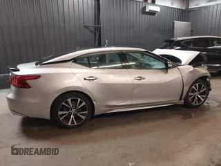 2016 Nissan Maxima SV z VIN 1N4AA6AP4GC415952, wystawiony jako IAAI lot #41806306 z przebiegiem 131 612 mil mil oraz . Historia ofert i sprzedaży dostępna na DreamBid. Obrazek 14.