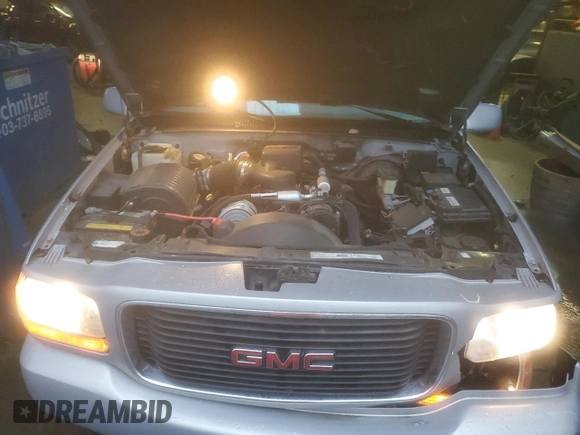 2000 GMC Denali z VIN 1GKEK13R9YR104210, wystawiony jako Copart lot #85599964 z przebiegiem 1 548 394 mil mil oraz Szkoda całkowita • Salvage title. Historia ofert i sprzedaży dostępna na DreamBid. Obrazek 13.