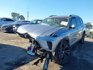 2022 Volkswagen Atlas SE z VIN 1V2JP2CA6NC502757, wystawiony jako IAAI lot #41247026 z przebiegiem 70 124 mil mil oraz . Historia ofert i sprzedaży dostępna na DreamBid. Obrazek 6.