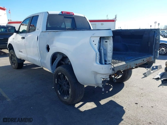 2010 Toyota Tundra 4WD Truck with VIN 5TFUW5F16AX102070, listed as a IAAI auction lot 41603206 with 214,742 mi miles. Bid and sale history available at carsss.com. Image 3.