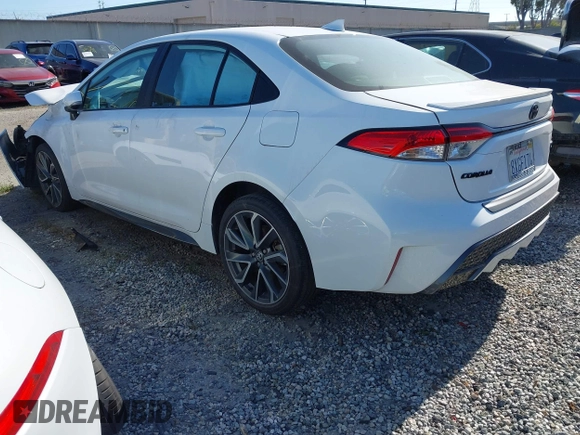 2021 Toyota Corolla SE with VIN 5YFS4MCE9MP084276, listed as a IAAI auction lot 42056696 with 39,544 mi miles and . Bid and sale history available at carsss.com. Image 3.