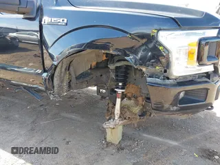 2019 Ford F-150 XL with VIN 1FTEW1EP2KFC91620, listed as a IAAI auction lot 42092443 with 89,305 mi miles and . Bid and sale history available at DreamBid. Image 6.