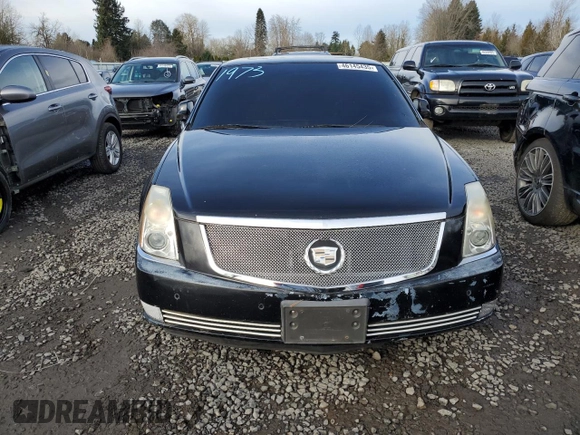 2006 Cadillac DTS 1SD z VIN 1G6KD57Y16U140102, wystawiony jako Copart lot #46145435 z przebiegiem 95 567 mil mil oraz Szkody całkowita. Historia ofert i sprzedaży dostępna na DreamBid. Obrazek 5.