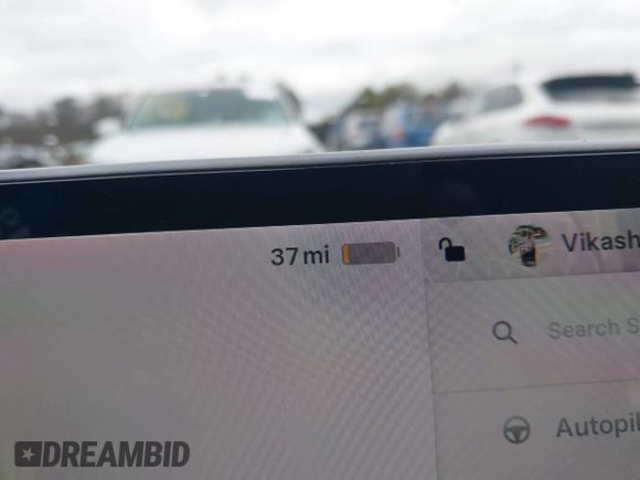 2022 Tesla Model 3 with VIN 5YJ3E1EA6NF143839, listed as a IAAI auction lot 40905007 with 83,897 mi miles and . Bid and sale history available at DreamBid. Image 16.