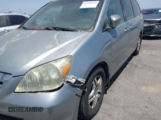 2005 Honda Odyssey EX with VIN 5FNRL38415B086709, listed as a IAAI auction lot 42308829 with 187,351 mi miles and . Bid and sale history available at DreamBid. Image 6.
