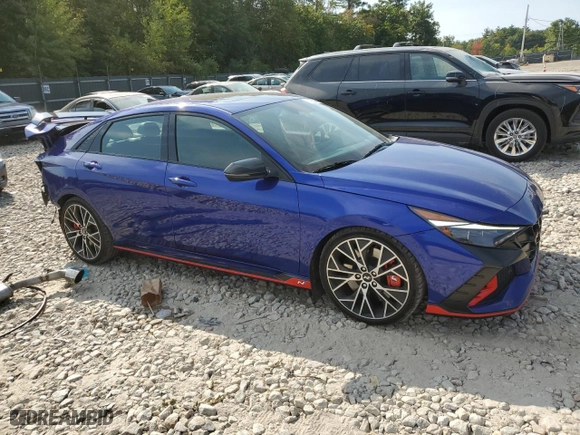 2022 Hyundai Elantra N with VIN KMHLW4AK1NU002953, listed as a Copart auction lot 71933364 with 27,515 mi miles and Salvage Title. Bid and sale history available at carsss.com. Image 4.