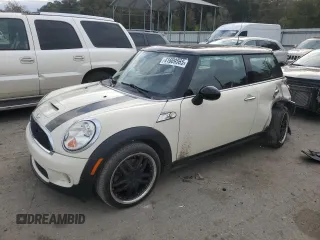 2007 MINI Hardtop S with VIN WMWMF735X7TL83242, listed as a Copart auction lot 41609565 with 83,320 mi miles and Salvage Title. Bid and sale history available at DreamBid. Image 1.