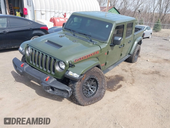 2023 Jeep Gladiator Mojave with VIN 1C6JJTEG6PL564504, listed as a IAAI auction lot 41752685 with 20,430 mi miles and . Bid and sale history available at DreamBid. Image 17.