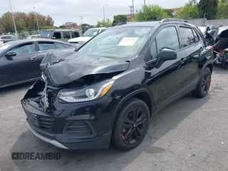 2020 Chevrolet Trax LT with VIN 3GNCJLSB8LL221077, listed as a IAAI auction lot 42421378 with 97,372 mi miles and . Bid and sale history available at DreamBid. Image 2.