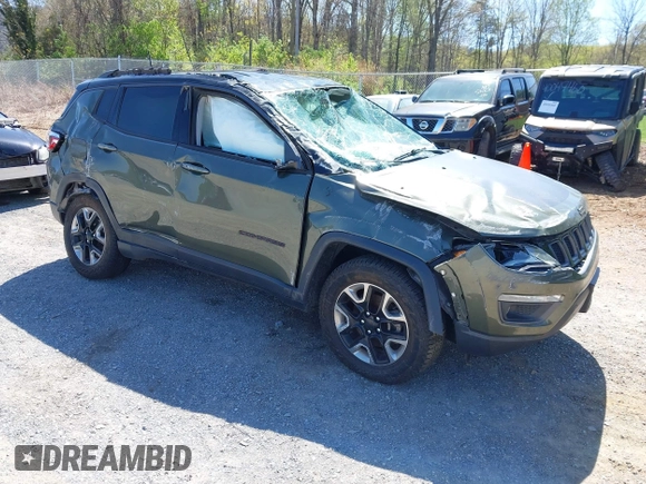 2018 Jeep Compass Trailhawk with VIN 3C4NJDDB0JT241163, listed as a IAAI auction lot 41986193 with 89,246 mi miles and . Bid and sale history available at DreamBid. Image 1.