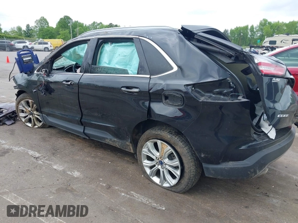 2020 Ford Edge Titanium z VIN 2FMPK4K98LBB12684, wystawiony jako IAAI lot #42134532 z przebiegiem 103 786 mil mil oraz . Historia ofert i sprzedaży dostępna na DreamBid. Obrazek 3.