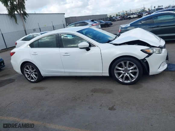 2017 Mazda Mazda6 Touring with VIN JM1GL1V50H1131757, listed as a IAAI auction lot 41563042 with 89,993 mi miles. Bid and sale history available at carsss.com. Image 13.