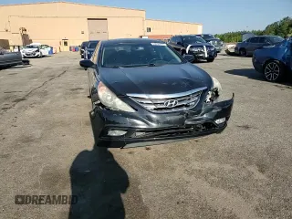 2012 Hyundai Sonata Limited z VIN 5NPEC4AC4CH429064, wystawiony jako Copart lot #53499355 z przebiegiem 203 928 mil mil oraz Szkoda całkowita • Salvage title. Historia ofert i sprzedaży dostępna na DreamBid. Obrazek 13.