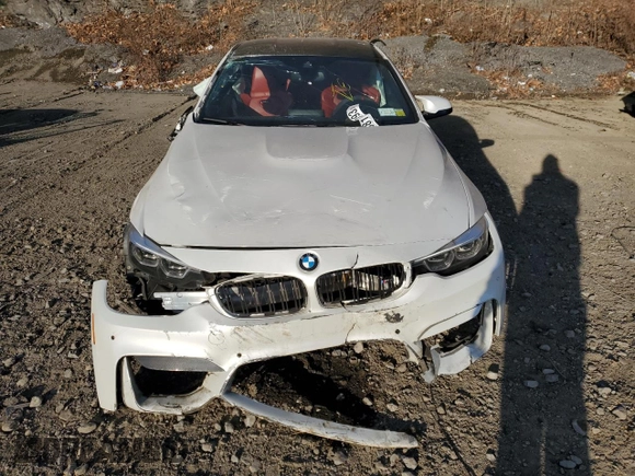 2018 BMW M4 with VIN WBS4Y9C57JAA92303, listed as a Copart auction lot 38811093 with 0 mi miles. Bid and sale history available at carsss.com. Image 5.
