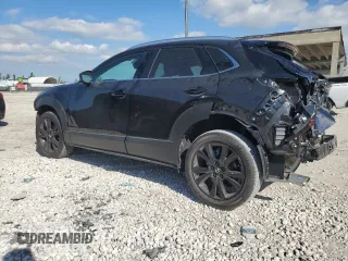 2024 Mazda CX-30 Premium z VIN 3MVDMBDY6RM602606, wystawiony jako Copart lot #81223314 z przebiegiem 4041 mil mil oraz Szkody całkowita. Historia ofert i sprzedaży dostępna na DreamBid. Obrazek 2.