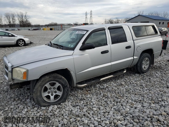2007 Dodge Dakota SLT with VIN 1D7HW48P97S197684, listed as a Copart auction lot 86328944 with 122,969 mi miles and Salvage Title. Bid and sale history available at carsss.com. Image 1.