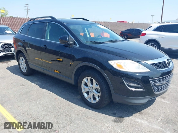 2012 Mazda CX-9 Touring with VIN JM3TB2CV5C0354750, listed as a IAAI auction lot 42181125 with 100,540 mi miles and . Bid and sale history available at carsss.com. Image 1.