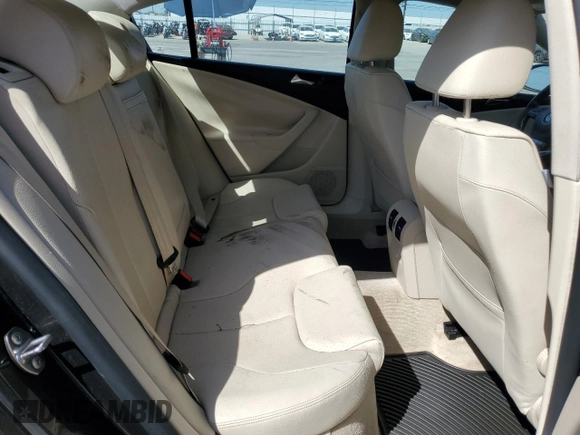 2010 Volkswagen Passat Komfort with VIN WVWJK7ANXAE129739, listed as a Copart auction lot 57798275 with 155,830 mi miles and Salvage title. Bid and sale history available at DreamBid. Image 10.