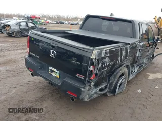 2022 Honda Ridgeline Sport with VIN 5FPYK3F15NB010408, listed as a IAAI auction lot 41538181 with 87,923 mi miles and . Bid and sale history available at DreamBid. Image 4.