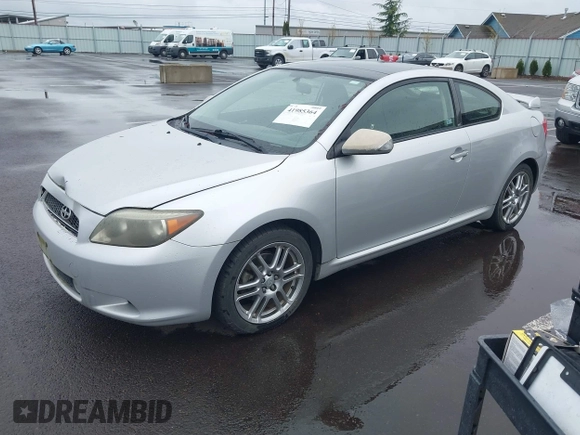 2006 Scion tC with VIN JTKDE177460073448, listed as a IAAI auction lot 41985364 with 170,640 mi miles. Bid and sale history available at carsss.com. Image 2.