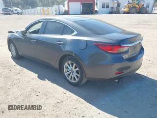 2016 Mazda 6 i Sport with VIN JM1GJ1U54G1413244, listed as a IAAI auction lot 42062416 with 148,970 mi miles and . Bid and sale history available at DreamBid. Image 3.