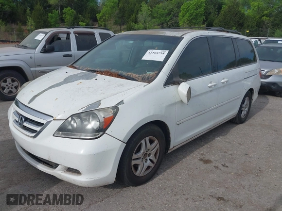2007 Honda Odyssey EX-L with VIN 5FNRL38787B051582, listed as a IAAI auction lot 42104718 with 193,630 mi miles and . Bid and sale history available at DreamBid. Image 2.
