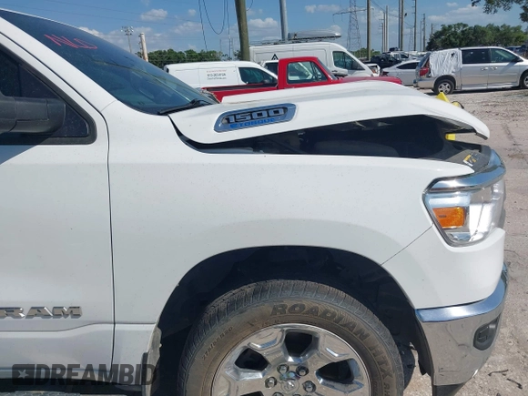 2022 Ram 1500 Big Horn z VIN 1C6RRFMG2NN430198, wystawiony jako IAAI lot #41944132 z przebiegiem 54 479 mil mil oraz . Historia ofert i sprzedaży dostępna na DreamBid. Obrazek 22.