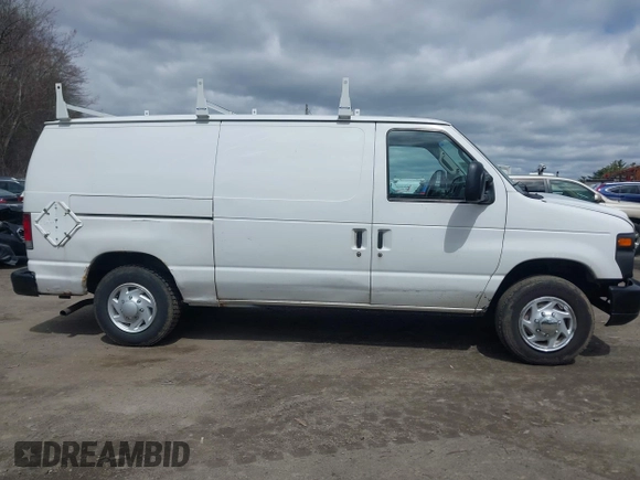 2010 Ford Econoline Cargo Commercial with VIN 1FTNE1EW0ADA90738, listed as a IAAI auction lot 42038940 with 183,195 mi miles and . Bid and sale history available at DreamBid. Image 13.