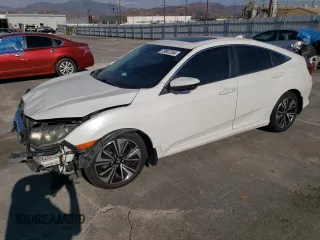 2016 Honda Civic EX-T z VIN 2HGFC1F34GH647453, wystawiony jako Copart lot #73807254 z przebiegiem 129 181 mil mil oraz Szkoda całkowita • Salvage title. Historia ofert i sprzedaży dostępna na DreamBid. Obrazek 1.