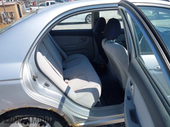 2007 Kia Spectra EX with VIN KNAFE121775415964, listed as a IAAI auction lot 41951831 with 176,903 mi miles. Bid and sale history available at carsss.com. Image 8.
