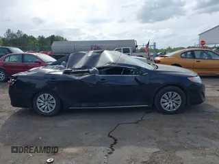 2012 Toyota Camry L z VIN 4T1BF1FK0CU131461, wystawiony jako IAAI lot #41957880 z przebiegiem 113 902 mil mil oraz . Historia ofert i sprzedaży dostępna na DreamBid. Obrazek 13.