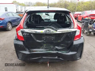 2015 Honda Fit EX-L with VIN 3HGGK5H88FM726406, listed as a IAAI auction lot 42033501 with 124,216 mi miles. Bid and sale history available at carsss.com. Image 16.