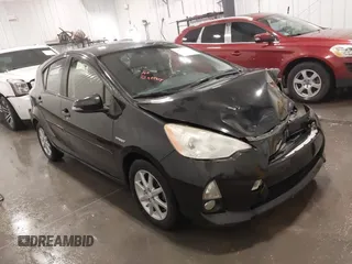 2012 Toyota Prius c One with VIN JTDKDTB35C1009930, listed as a IAAI auction lot 41961471 with 174,252 mi miles. Bid and sale history available at carsss.com. Image 1.