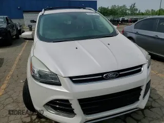 2015 Ford Escape Titanium с VIN 1FMCU9J95FUC87156, выставлен на аукционе Copart как лот 60097165 с пробегом 111 275 миль миль и Списание • Salvage title. История ставок и продаж доступна на DreamBid. Изображение 14.