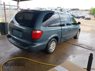 2006 Dodge Grand Caravan SE with VIN 1D4GP24R36B605743, listed as a IAAI auction lot 42068947 with 324,595 mi miles and . Bid and sale history available at DreamBid. Image 4.