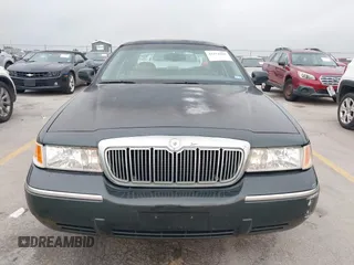 2002 Mercury Grand Marquis LS Premium z VIN 2MEFM75WX2X626520, wystawiony jako IAAI lot #42374203 z przebiegiem 139 692 mil mil oraz . Historia ofert i sprzedaży dostępna na DreamBid. Obrazek 6.
