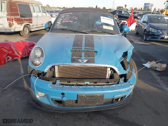 2013 MINI Cooper Roadster S with VIN WMWSY3C55DT594628, listed as a IAAI auction lot 41316950 with NaN miles. Bid and sale history available at carsss.com. Image 12.